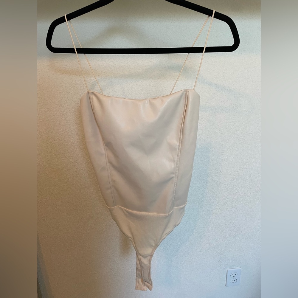 Cream colored faux leather tank top body suit